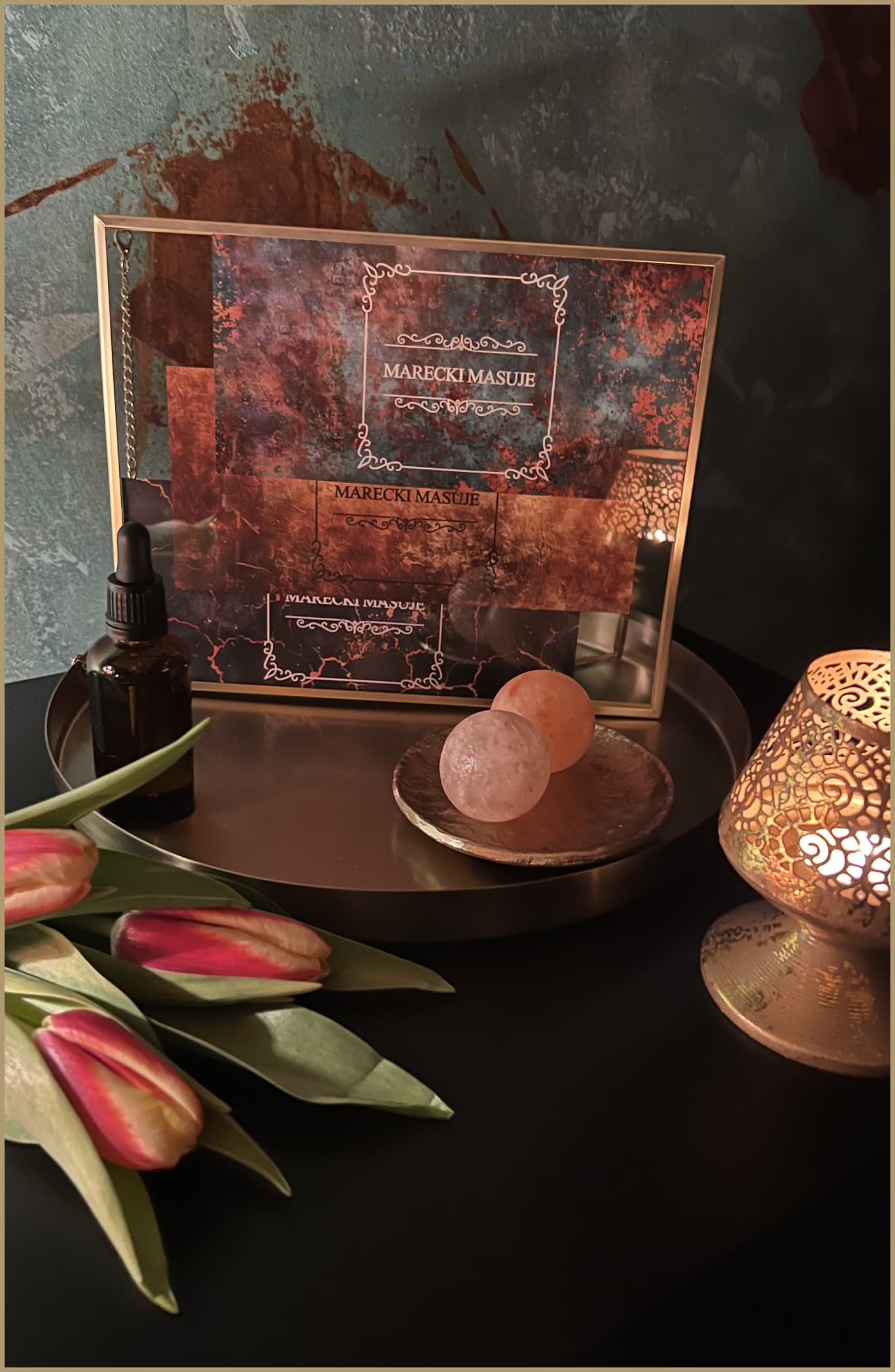 Copper bowls with spa treatments on a tray with decorative lighting